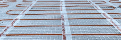 Electric underfloor heating cables close-up